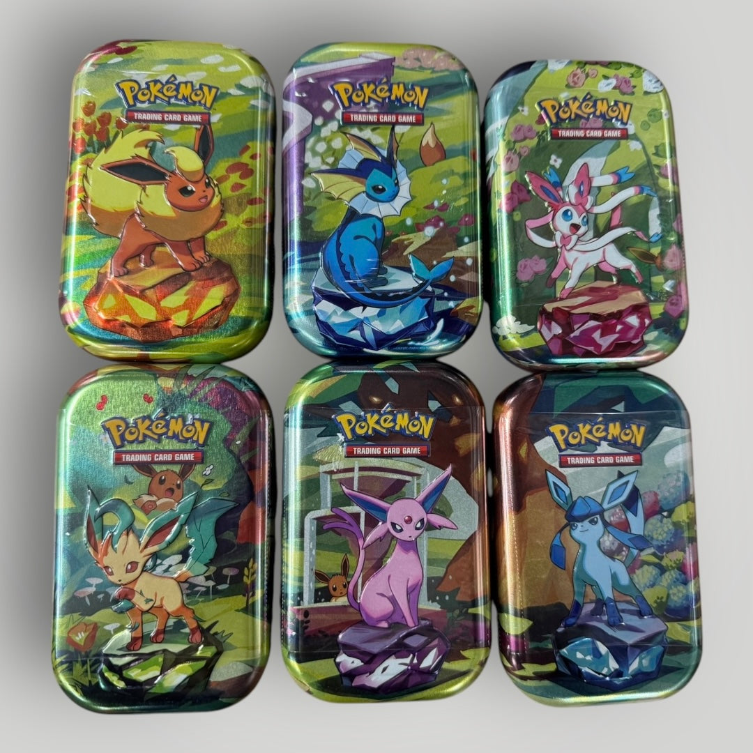 Pokemon: Prismatic Evolutions Mini Tin (Style may very)  POP'N TOYZ